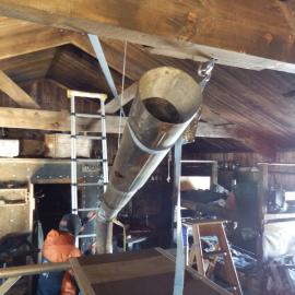 Flue installation in Scott's 'Terra Nova' Hut 