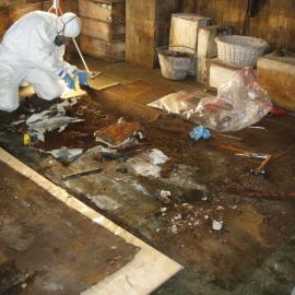 Asbestos removal, stove in Scott's 'Terra Nova' Hut 