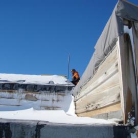 Repairing wind vane, Scott's 'Terra Nova' Hut 