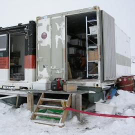 2013-14 AHT containers at the field camp on Home Beach, Cape Evans