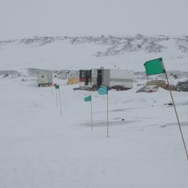 2013-14 Wayfinding flags at the AHT field camp on Home Beach, Cape Evans