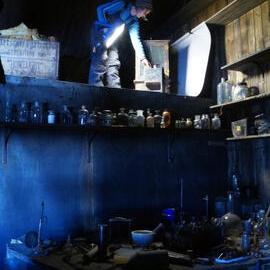 2013-14 Nicola Dunn on the roof of the Darkroom inside Scott's 'Terra Nova' hut