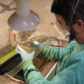 2013-14 Josiah Wagener emptying cans underneath a fume hood (004)