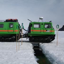 2013-14 Hägglunds travelling over a crack in the sea-ice