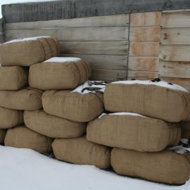 2013-14 Wrapped fodder bales outside Scott's 'Terra Nova' hut, Cape Evans