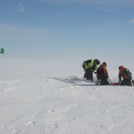 2013-14 AHT staff preparing tracks over a crack in the sea ice
