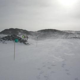 2013-14 AHT team following the wayfinding flags, Cape Royds