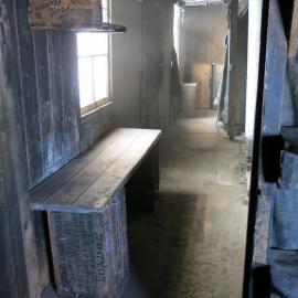 2013-14 Location image, empty shelves , Scott's 'Discovery' hut, Hut Point