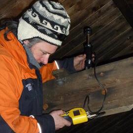 2009-10 AHT's Gord Macdonald taking moisture measurements, Scott's 'Terra Nova' hut