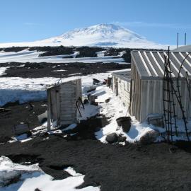 Northwest elevation of  Scott's 'Terra Nova' hut and Mount Erebus