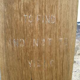 The carved lettering on Observation Hill Cross