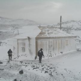 Snow build-up, southwest elevation of Shackleton's 'Nimrod' hut