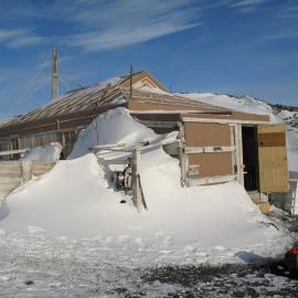 Snow build-up, northwest elevation of Shackleton's 'Nimrod' hut 