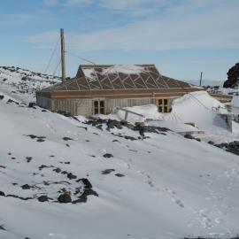 Snow build-up, north elevation of Shackleton's 'Nimrod' hut