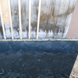 Fixed Butynol valance at base of south wall, Shackleton's 'Nimrod' hut