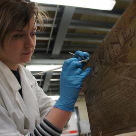 2012 AHT's Georgina Whiteley treating whisky crate, Scott Base