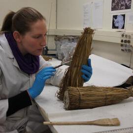 2012 AHT's Susanne Grieve treating whisky bottle cover, Scott Base