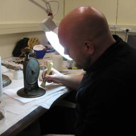 2012 AHT's Stefan Strittmatter treating weigh scale, Scott Base