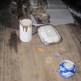 2010-11 Artefacts on the wardroom table inside Scott's 'Terra Nova' hut