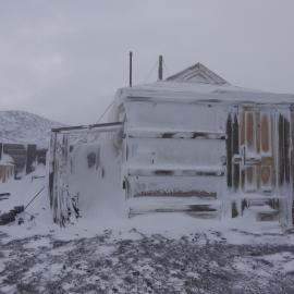 2010-11 Snow build-up around the West wall and latrine, Cape Royds