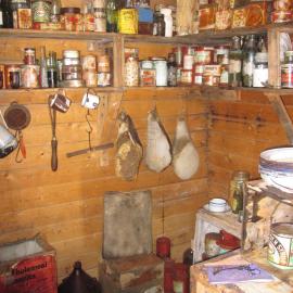 2010-11 Food provisions stacked on shelves inside Shackleton's 'Nimrod' hut