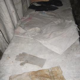 2010-11 Garments on a bunk inside Shackleton's 'Nimrod' hut