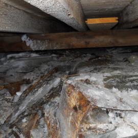 2010-11 Ice build-up underneath Shackleton's 'Nimrod' hut (001)