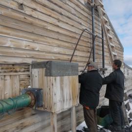 2010-11 Al Fastier and John Taylor working on the East wall, Cape Evans