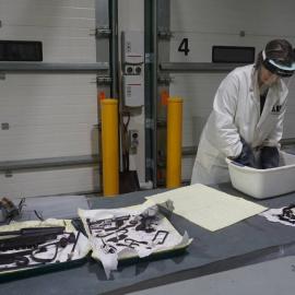 2022 Conservators at work, Belinda Hager applying a protective coating
