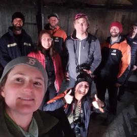 Sarah Bouckoms leads a tour inside Scott's 'Discovery' hut