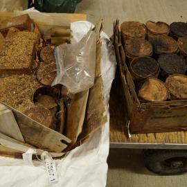 Boxes of food tins before treatment