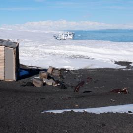 Latrine, boxes and anchor outside Scott's 'Terra Nova' hut