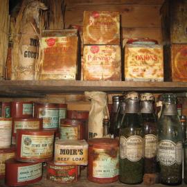 Tinned and bottled food in galley, Shackleton's 'Nimrod' hut (001)