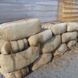 2010-11 Fodder bales stacked outside the Stables, Cape Evans