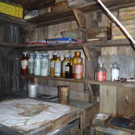 2010-11 Photographic supplies on the shelves within the Darkroom, Cape Evans
