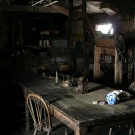 2010-11 Artefacts on the Wardroom table inside Scott's 'Terra Nova' hut