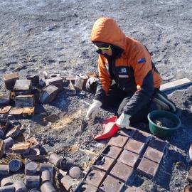2010-11 Diana Komejan excavating historic provisions