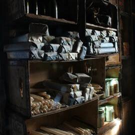 2010-11 Candles stacked inside Shackleton's 'Nimrod' hut, Cape Royds