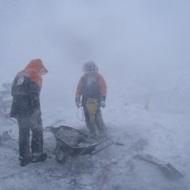 2010-11 Al Fastier working in bad weather at Cape Royds