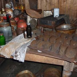 2010-11 Bread pans on a table in the Galley inside Scott's 'Terra Nova' hut