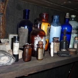 2010-11 Medicinal bottles on a shelf inside Scott's 'Terra Nova' hut