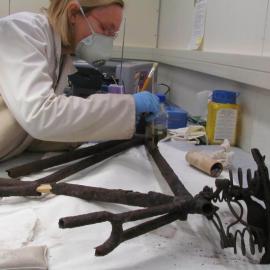 AHT Conservator Julie Unruh treating bicycle frame