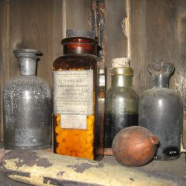 2010-11 Bottle of Ammonium Bromide pills inside Scott's Terra Nova' hut