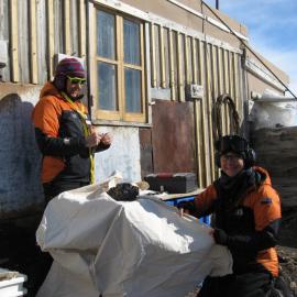 2010-11 Diana Komejan and Cricket Harbeck recovering fodder bales, Cape Royds