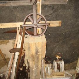 2010-11 Wheel pulley and other tools inside Mawson's laboratory, Cape Royds