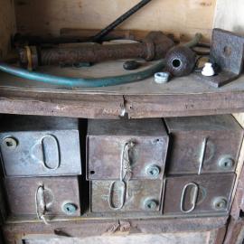 2010-11 Square oil tins in the cold porch of Shackleton's 'Nimrod' hut