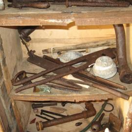 2010-11 Metal tools in the cold porch of Shackleton's 'Nimrod' hut