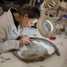 2014 AHT winter conservators at work - Stefanie White treating bamboo-framed net (002)
