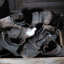 2014 Shackleton's 'Nimrod' hut interior, leather boots in crate