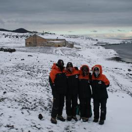 2014 AHT winter conservation team in front of Scott's 'Terra Nova' hut, Cape Evans